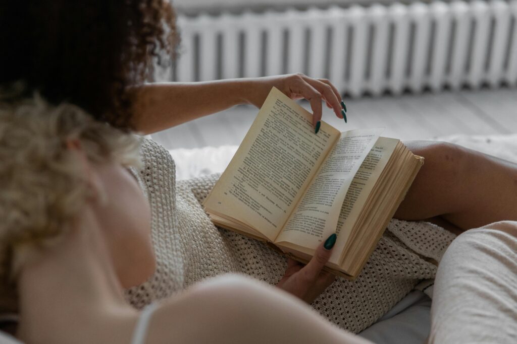 disconnect from technology - a woman reads a book