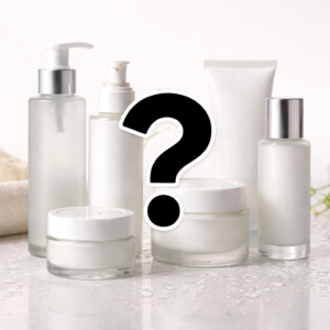 Six unlabeled, generic face moisturizer containers and bottles of varying sizes arranged on a clean white counter with visible water droplets, overlaid with a large black question mark against a soft white background.