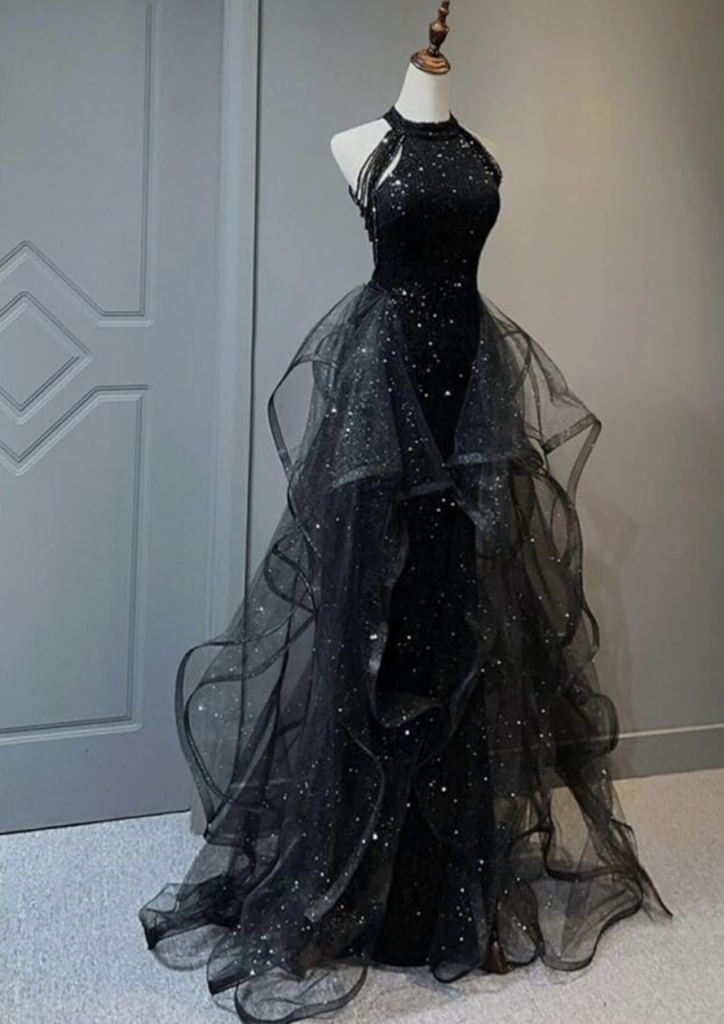 a High Neck Sequins Prom Dresses Long A-Line Tulle Sparkly Formal Evening Dresses Ball Gowns for Women rests on a mannequin