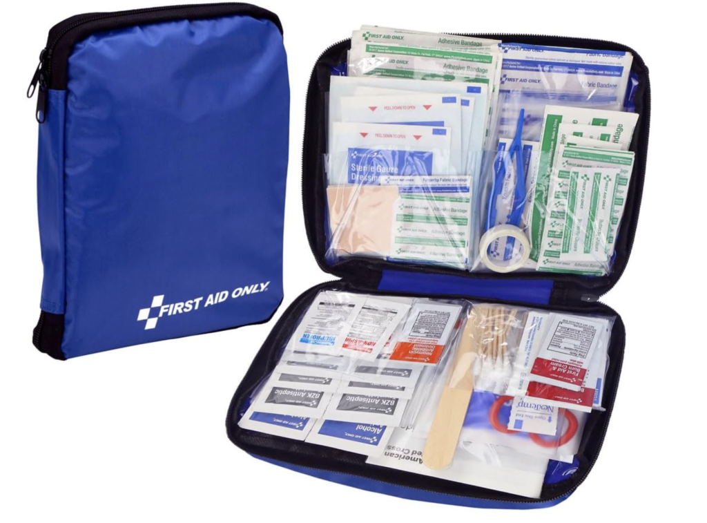 First Aid Only portable first aid kit in a blue zippered pouch containing adhesive bandages, sterile gauze, antiseptic wipes, tape, scissors, and emergency wound care items for travel, home, or car use.