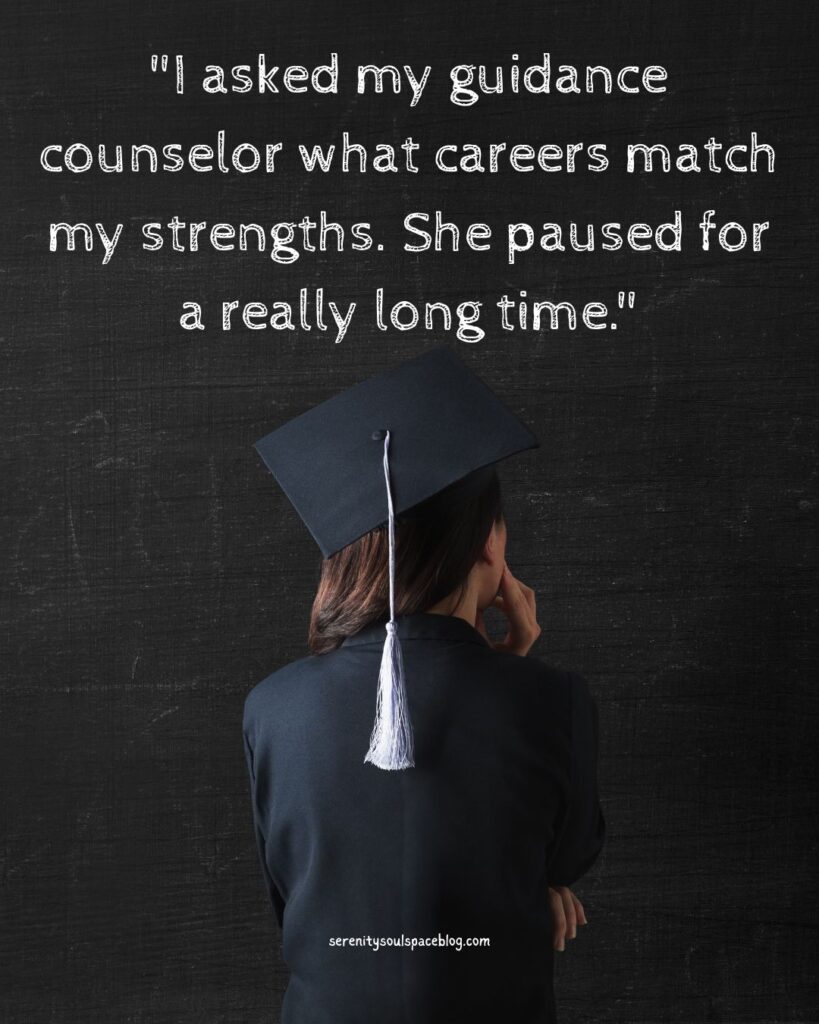 Graduate in a black cap and gown standing with back to the camera against a dark textured wall, with the quote “I asked my guidance counselor what careers match my strengths. She paused for a really long time.” displayed above and serenitysoulspaceblog.com at the bottom.