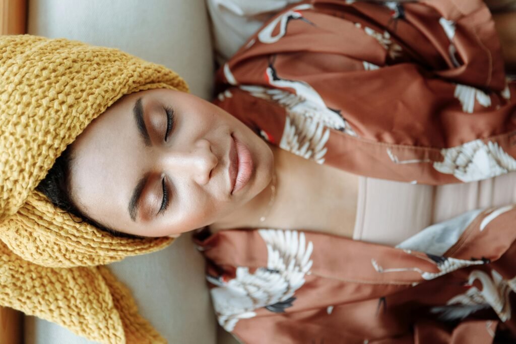 Blue Heron Blood Pressure Exercises - a woman relaxes with her eyes closed and lying down