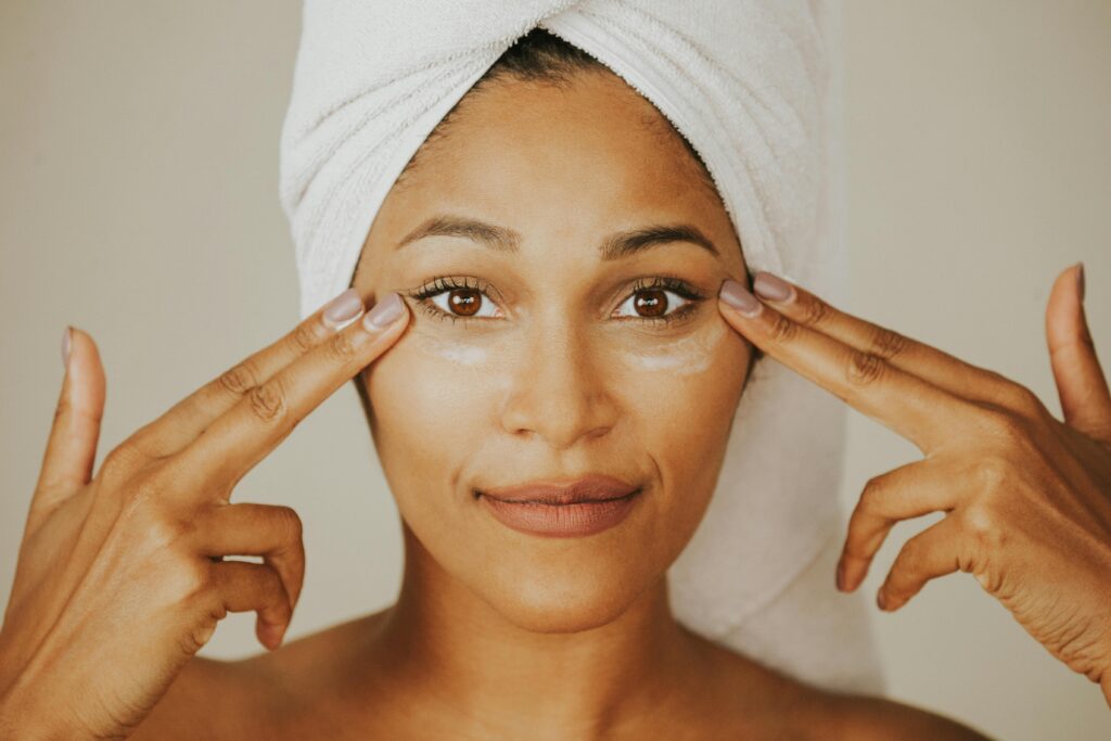 mature skin serums - a woman doing her skincare routine