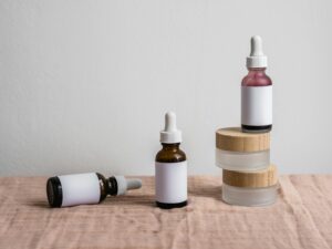 mature skin serums for women - bottles of unmarked skin serum bottles