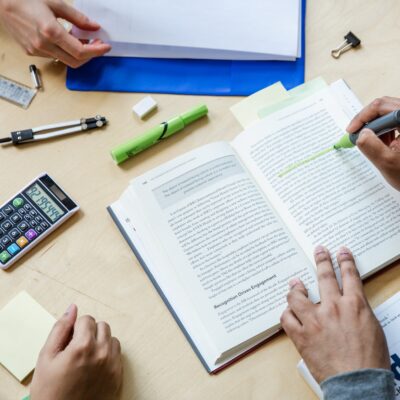 study tips for students with adhd - 3 students studying all you see is hands, highlighters, and books