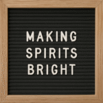 the featured image for this article which is a letter board that reads, "MAKING SPIRITS BRIGHT"