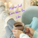 Winter Self Care Ideas Featured Image of a pair of feet wrapped in comfy winter socks, relaxed on the couch and holding a mug of a warm beverage
