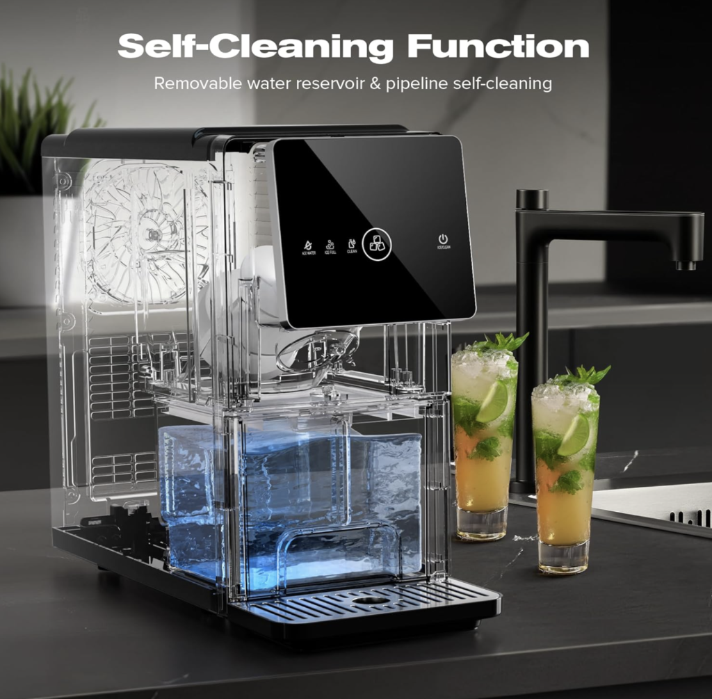 Countertop nugget ice maker shown with a transparent cutaway view highlighting the removable water reservoir and internal self-cleaning system, labeled “Self-Cleaning Function,” sitting on a kitchen counter beside two lime and mint drinks.
