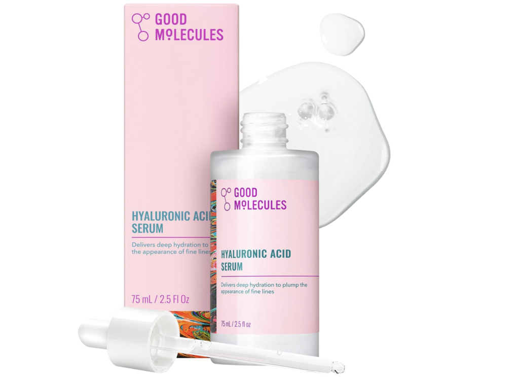 Good Molecules Hyaluronic Acid Serum bottle with dropper displayed beside its pink product box, with a clear serum swatch behind the bottle highlighting the hydrating skincare formula.