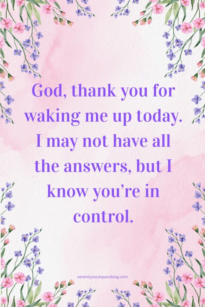 Soft floral background with delicate pink and purple flowers framing an inspirational prayer that thanks God for a new day and expresses trust in His control, with a gentle pastel aesthetic and a small website link at the bottom.