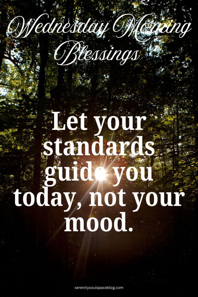 Pinterest-style image with sunlight shining through a dense forest, creating a warm glow and light rays. Text reads “Wednesday Morning Blessings” and “Let your standards guide you today, not your mood.” The website name appears at the bottom.