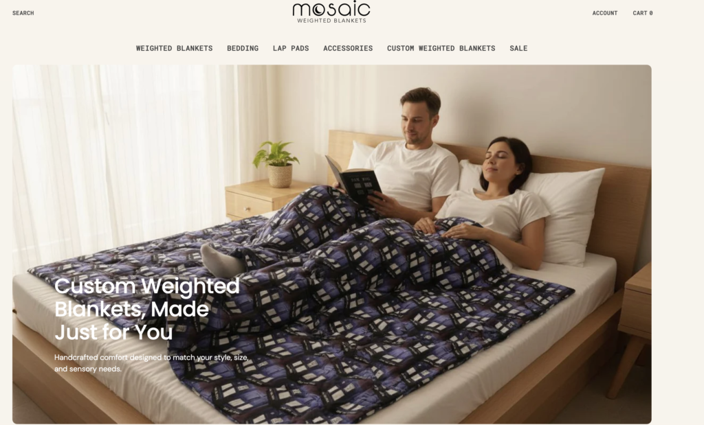 Custom weighted blanket displayed on a bed with a couple relaxing in a bright bedroom. One person reads a book while the other rests peacefully under a patterned weighted blanket designed for comfort, relaxation, and sensory support.